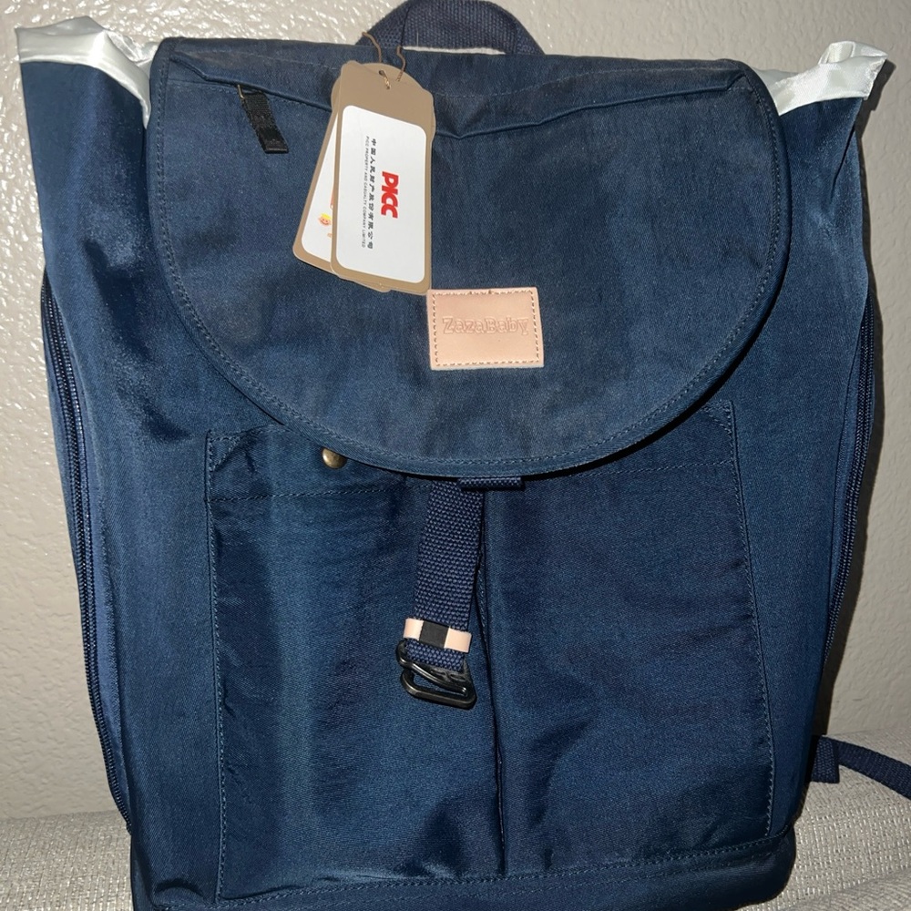 BRAND NEW WITH TAGS-Diaper bag backpack.. multiple pockets